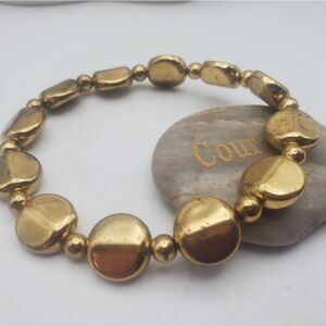 Gold toned drop beaded‎ statement bracelet